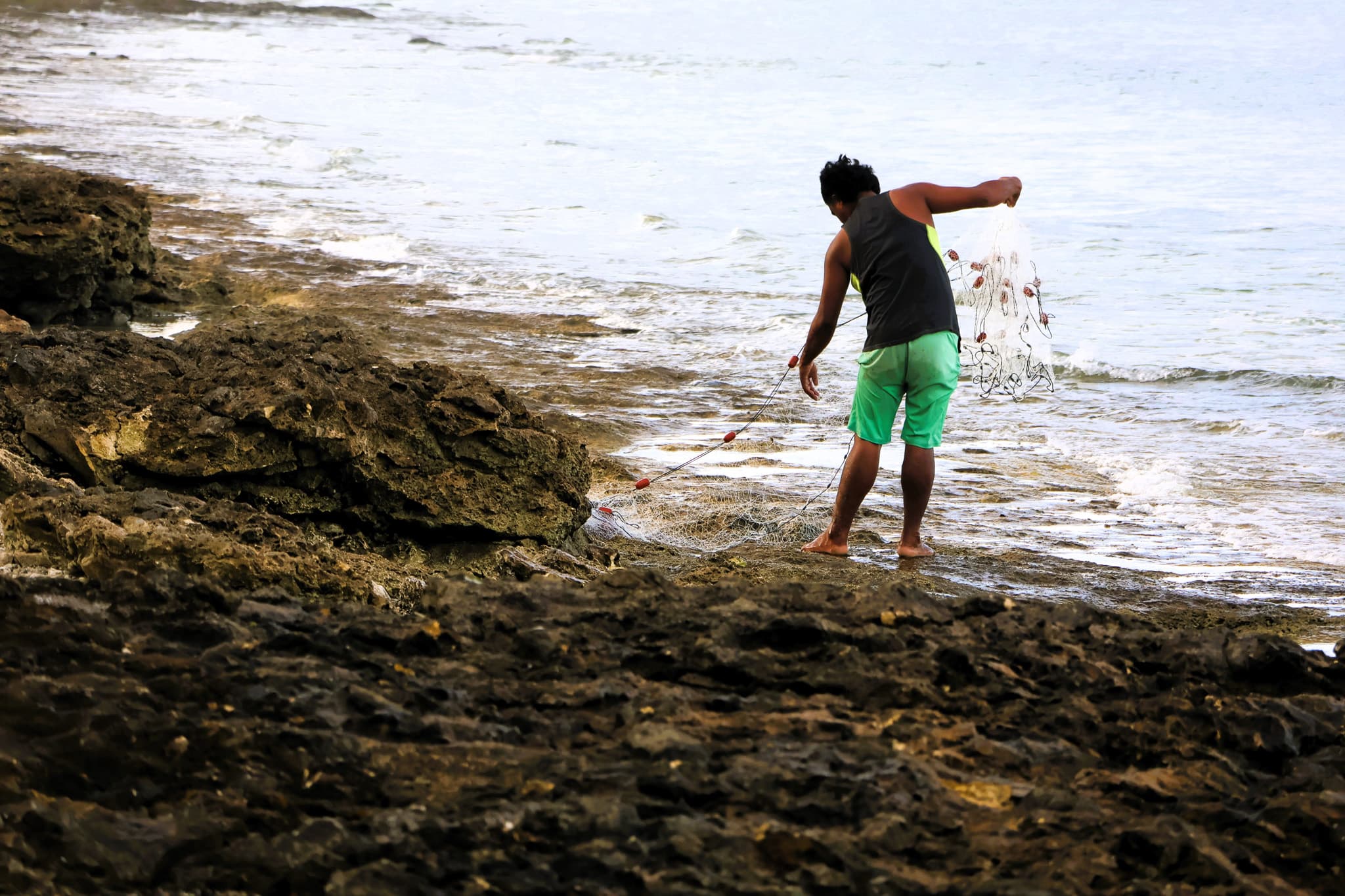 Tuvalu fisherman along the coast